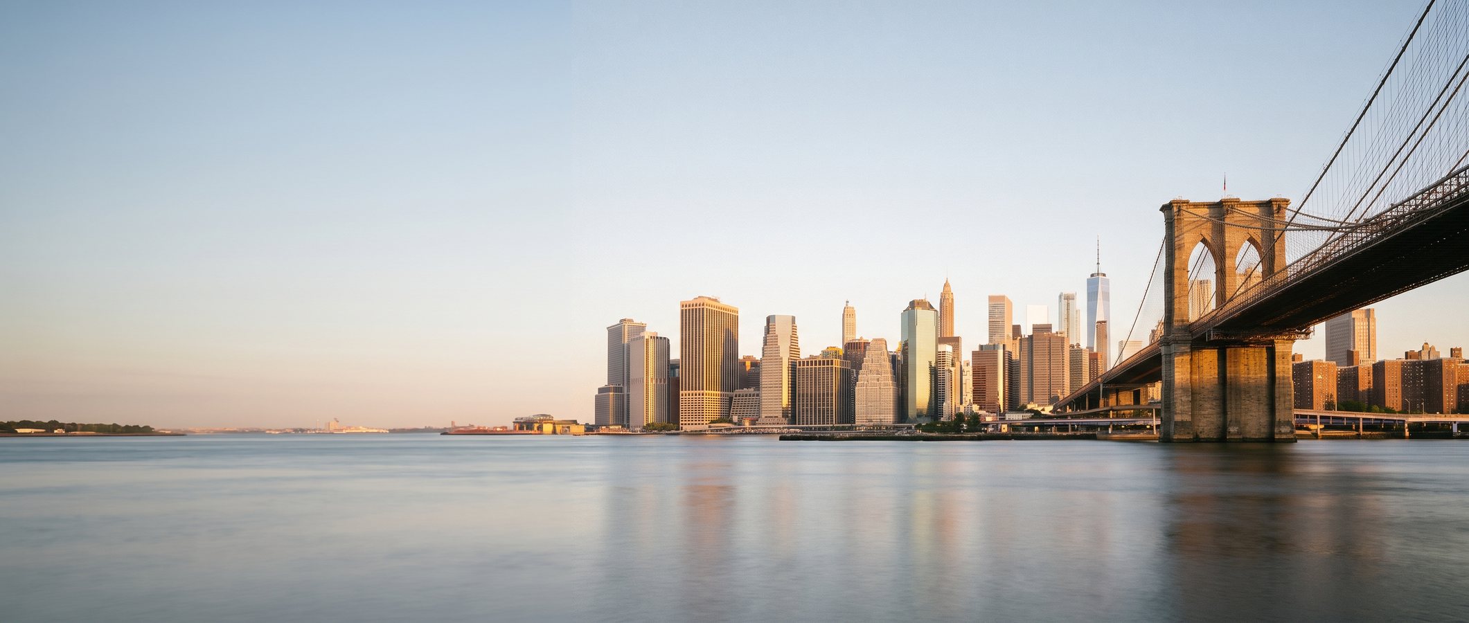Brooklynský most a Manhattan při západu slunce, New York